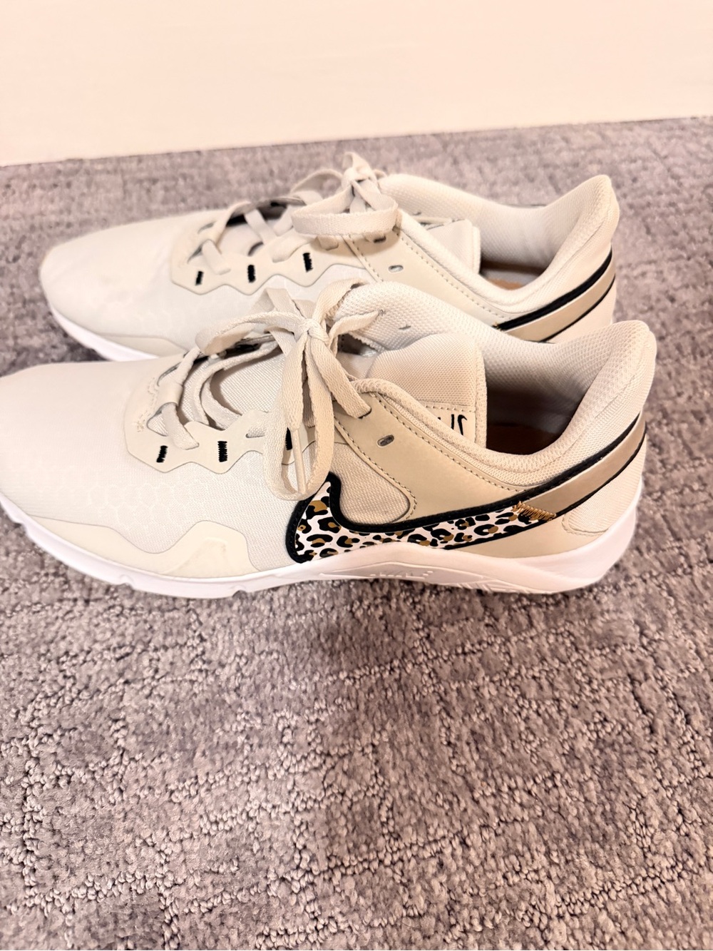 Nike Women's Beige Athletic Shoes with Leopard Swoosh